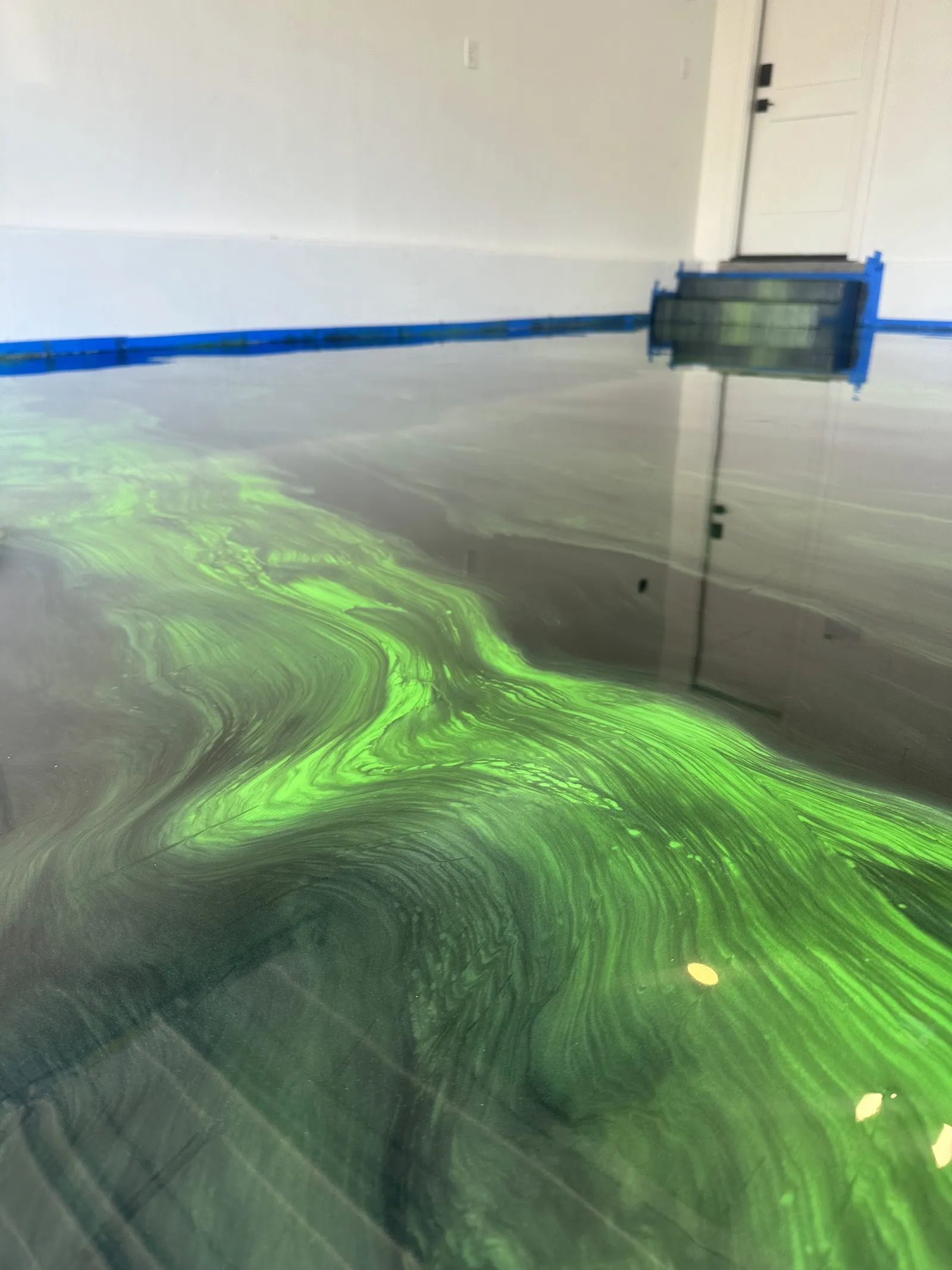 Metallic epoxy floor finish showing colour depth